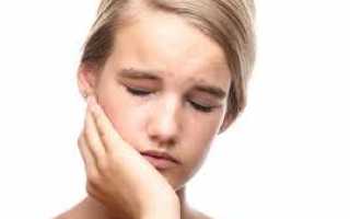 Почему болит челюсть возле уха и как это вылечить?